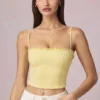 Top camisola Hania de modal con bordado inglés en amarillo limón