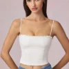 Top camisola Hania de modal con bordado inglés en blanco