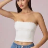 Top camisola Hania de modal con bordado inglés en blanco