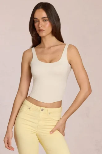 Top con lazo trasero de modal Norelle en color marfil
