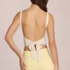 Top con lazo trasero de modal Norelle en color marfil