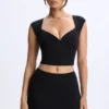 Top Cora de modal con fruncidos y mangas casquillo en negro