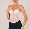Top corsé bandeau con cordones Zoa en color marfil