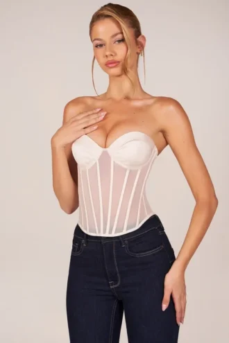 Top corsé bandeau con cordones Zoa en color marfil