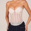 Top corsé bandeau con cordones Zoa en color marfil