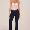 Top corsé bandeau con cordones Zoa en color marfil