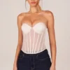 Top corsé bandeau con cordones Zoa en color marfil