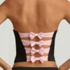 Top corsé con aberturas y lazo Audrina en negro