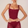 Top corsé con cordones Jemara en rojo cereza