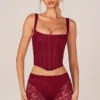 Top corsé con cordones Jemara en rojo cereza