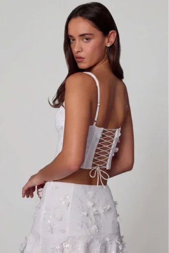 Top corsé con cordones y adornos Letitia en blanco