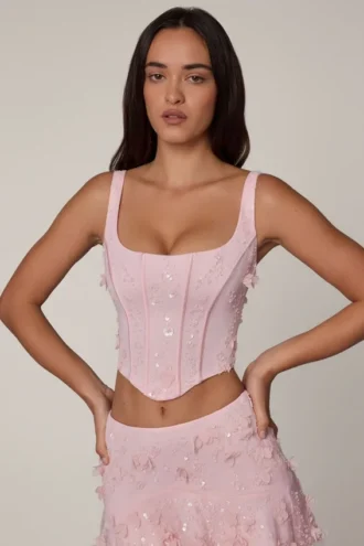 Top corsé con cordones y adornos Letitia en rosa suave