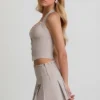 Top corsé con cuello halter Lotta en color crudo