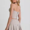 Top corsé con cuello halter Lotta en color crudo