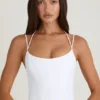 Top corsé con tirantes y cuello halter Elba en blanco