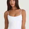 Top corsé con tirantes y cuello halter Elba en blanco