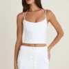 Top corsé con tirantes y cuello halter Elba en blanco