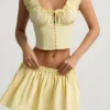 Top corsé de popelín de algodón fruncido Faela en amarillo limón