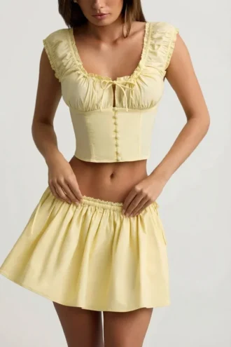 Top corsé de popelín de algodón fruncido Faela en amarillo limón