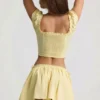 Top corsé de popelín de algodón fruncido Faela en amarillo limón