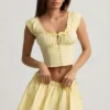 Top corsé de popelín de algodón fruncido Faela en amarillo limón