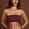 Top corto bandeau con flecos y cordones Bruma en rojo vino