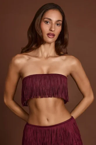 Top corto bandeau con flecos y cordones Bruma en rojo vino