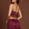 Falda de talle medio con flecos Maristella en rojo vino