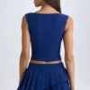 Top corto con abertura frontal Kadie en azul marino
