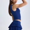 Top corto con abertura frontal Kadie en azul marino