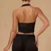 Top corto con cuello halter y lazo delantero Harbour en negro
