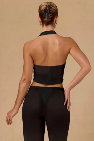 Top corto con cuello halter y lazo delantero Harbour en negro