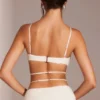 Top corto con tirantes y aros adornado Parma en blanco
