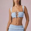 Top corto con volantes y lazo delantero Ottilie en azul claro