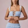 Top corto con volantes y lazo delantero Ottilie en azul claro