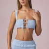 Top corto con volantes y lazo delantero Ottilie en azul claro