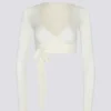 Top corto cruzado de jersey suave en blanco
