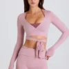 Top corto cruzado de jersey suave en malva
