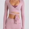 Top corto cruzado de jersey suave en malva