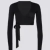 Top corto cruzado de jersey suave en negro