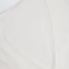 Top corto cruzado Lou de punto calado en blanco