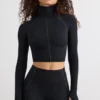 Top corto de cuello alto Soft Active en negro