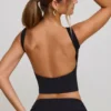 Top corto de cuello alto y espalda abierta Wren en negro