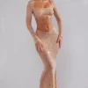 Top corto de manga larga con adornos transparentes Giulia en color almendra