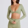 Top corto de manga larga en color matcha