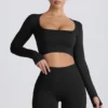 Top corto de manga larga sin costuras Super Sculpt en negro