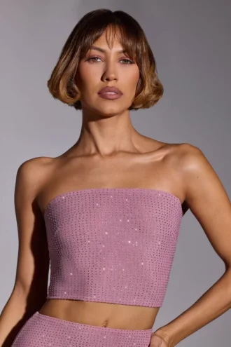 Top corto sin tirantes con adornos Odetta en rosa claro