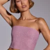 Top corto sin tirantes con adornos Odetta en rosa claro
