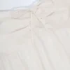Top corto sin tirantes con lazo delantero de popelín de algodón Alma en blanco
