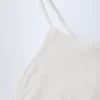 Top corto tipo camisola con fruncidos Livia Pointelle en blanco